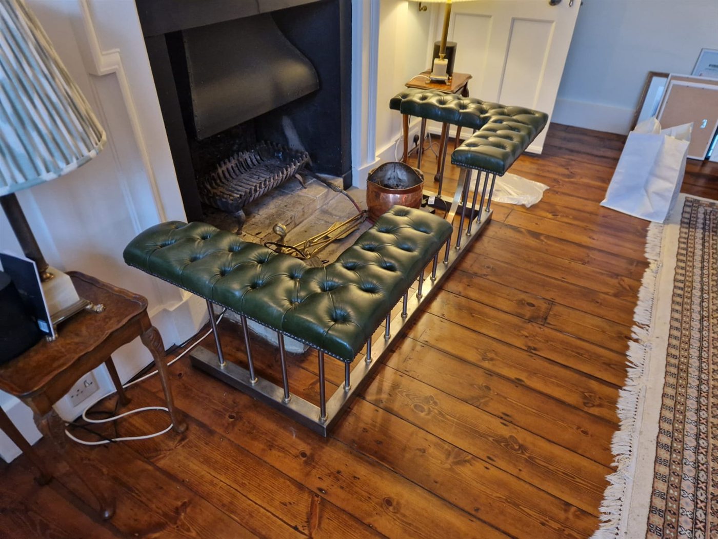 The finished club fender around the fireplace