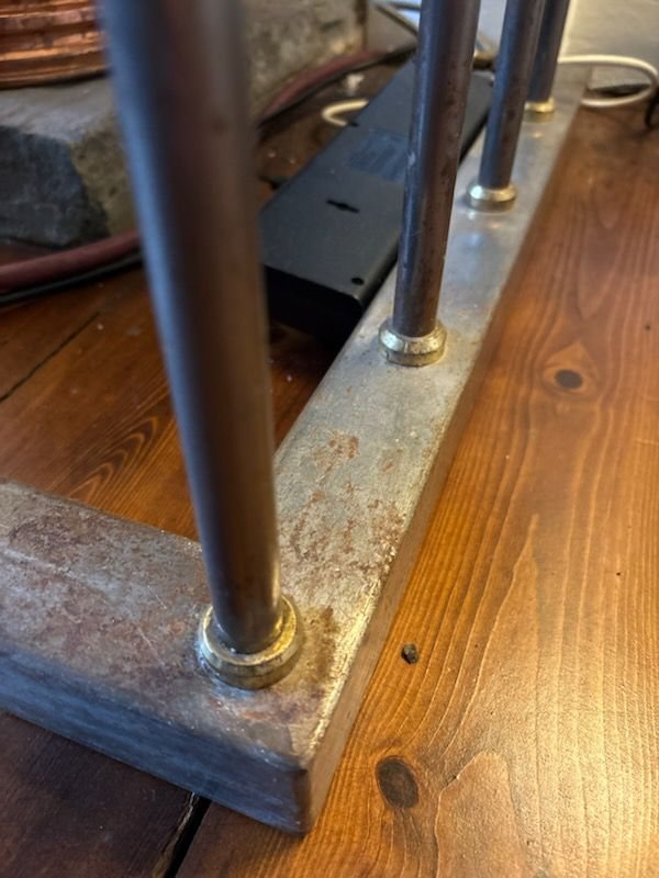 Surface rust at a corner of the fender base