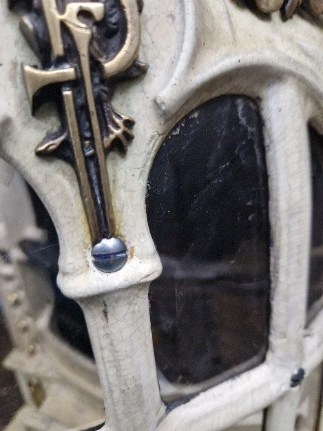 The brass door latch and new mica