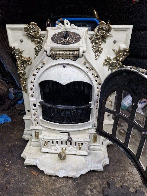 The finished fireplace with its door open