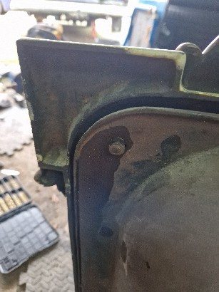 Rusted fixings on the cast iron body