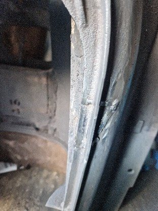 The damaged section re-attached