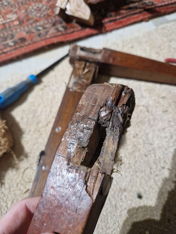 A failed mortise in the rear leg